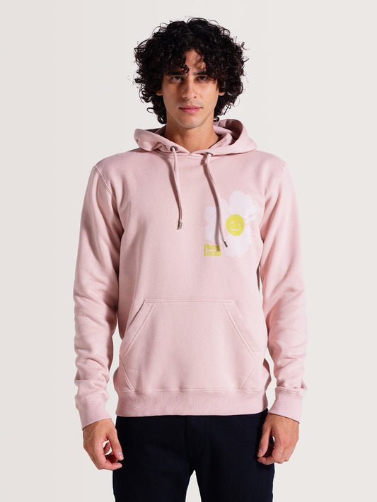Moletom canguru rosa venice com capuz ajustável por cordão, bolso frontal, flor branca com smile amarelo estampado no peito. Design casual e descontraído.