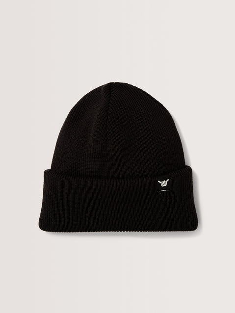 Gorro preto de malha canelada, com dobra ajustável na base e detalhe de patch lateral preto com símbolo branco Hang Loose estilizado.