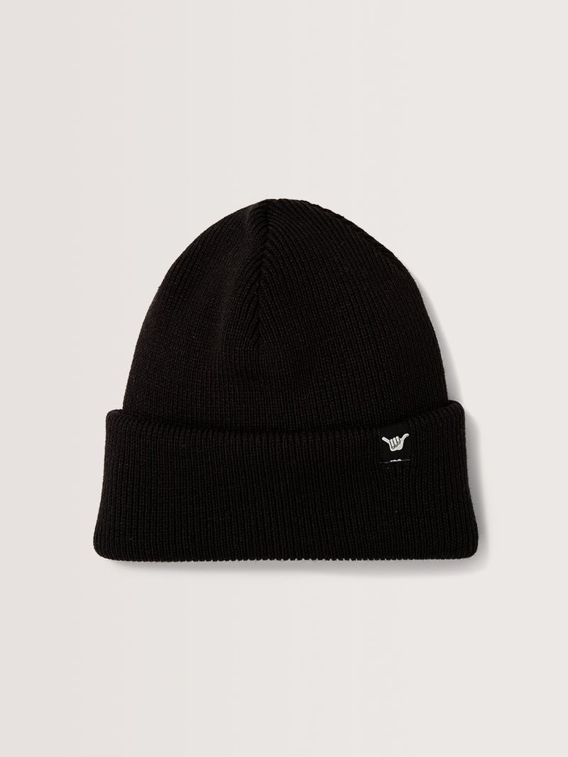 Gorro preto de malha canelada, com dobra ajustável na base e detalhe de patch lateral preto com símbolo branco Hang Loose estilizado.